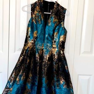 Vince camuto dress with metallic rose gold accent.